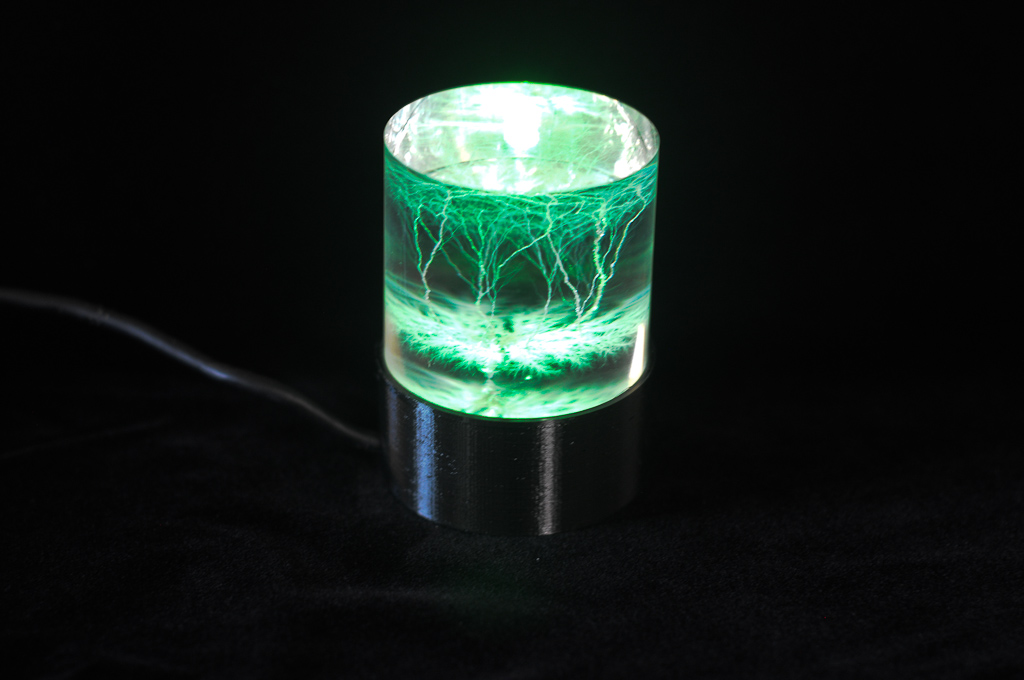 Lichtenberg figure on finished base during green phase of illumination.